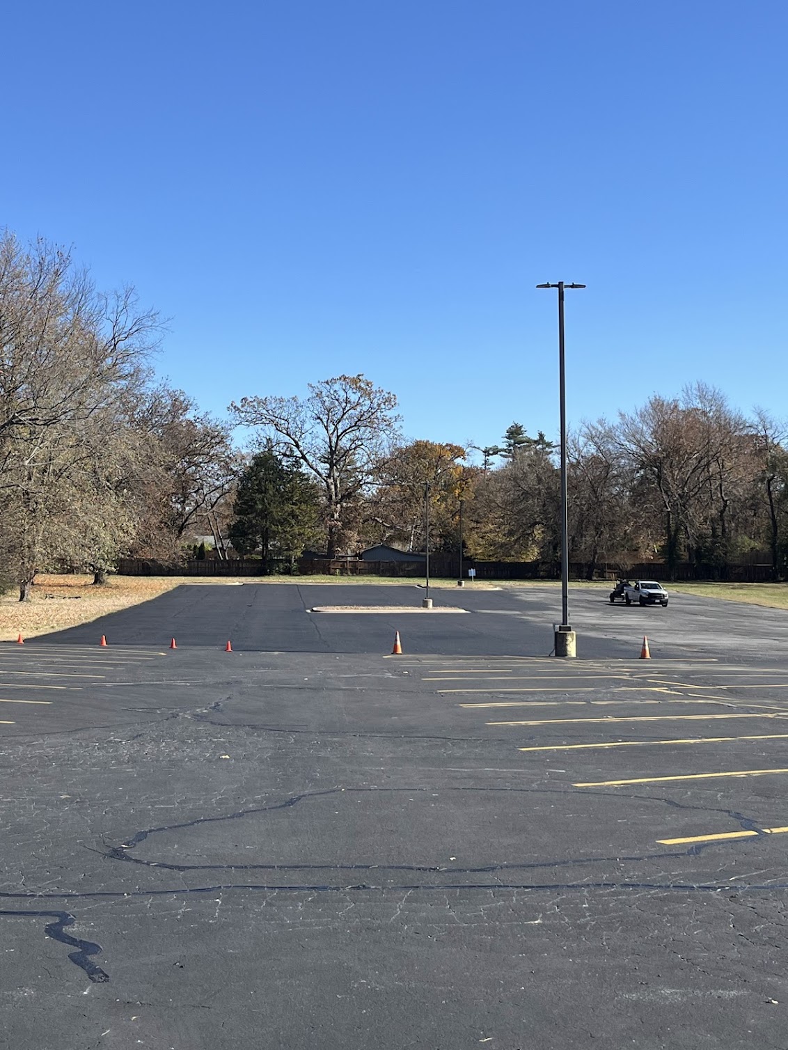 417 Striping & Sealing parking lot striping and sealcoating project at East Grand Church of Christ with clean, freshly marked asphalt